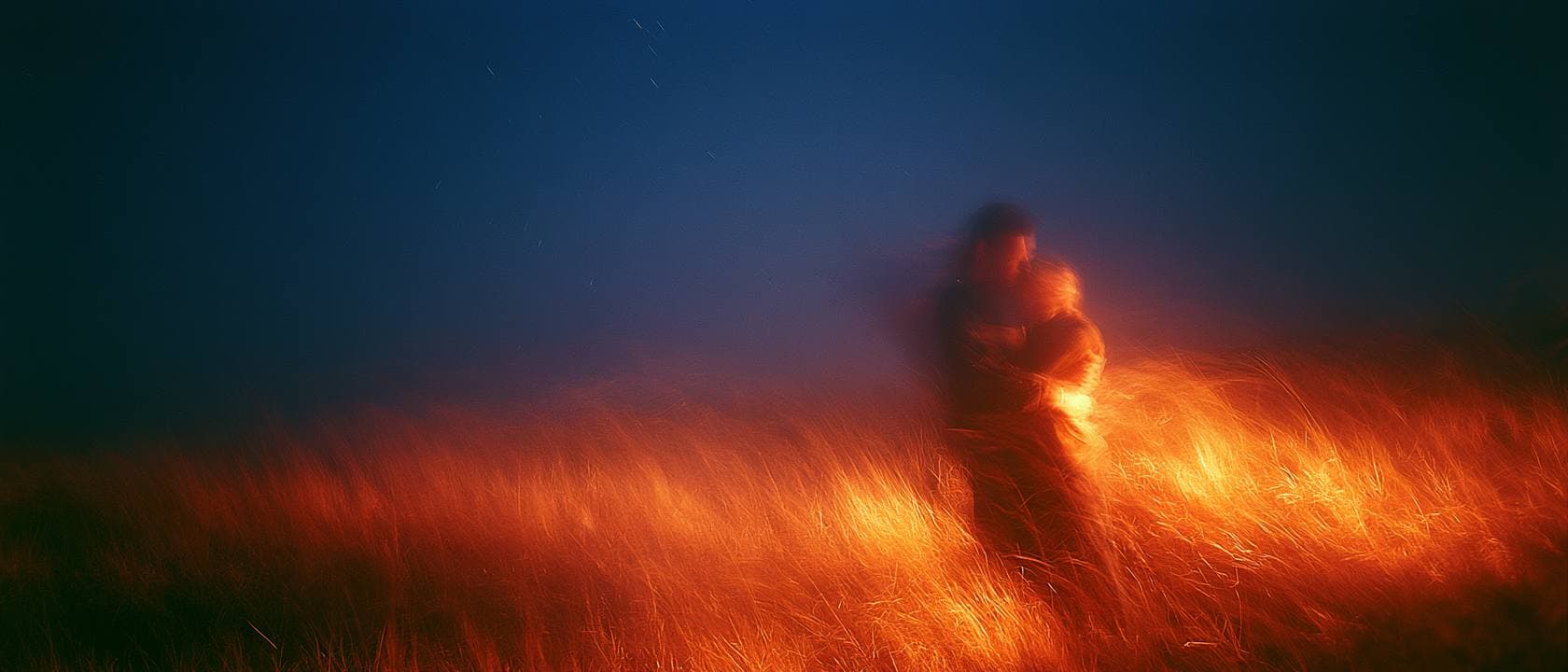 Impressionist oil painting of a couple embracing right of center in burning grass, under a vast indigo night sky
